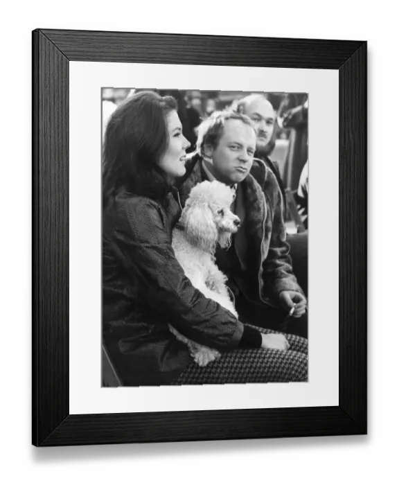 Framed Print : Diana Rigg holding poodle with John Bird at Oxfam charity press call - November 1960