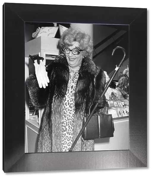 Barry Humphries as Dame Edna Everage outside the shop window at Selfridges
