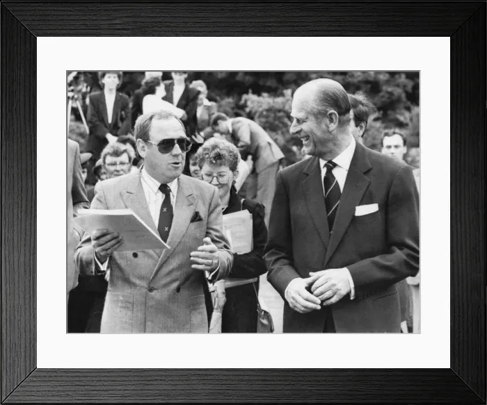Framed Print : The Duke of Edinburgh talking to Andy Cameron - June 1980 Framed Print : The Duke of Edinburgh talking to Andy Cameron - June 1980