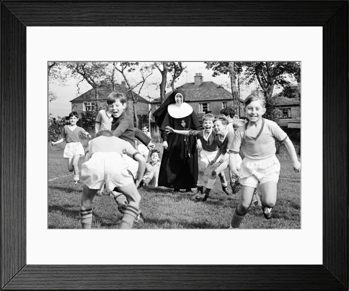 Framed Print : Sister Gabriel, chief coach, manager and trainer of the St Joseph