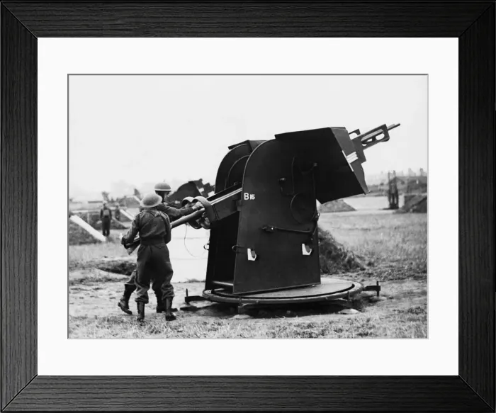 Framed Print : First pictures of the Home Guard A. A in action loading a projector. 8th July 1942 Framed Print : First pictures of the Home Guard A. A in action loading a projector. 8th July 1942
