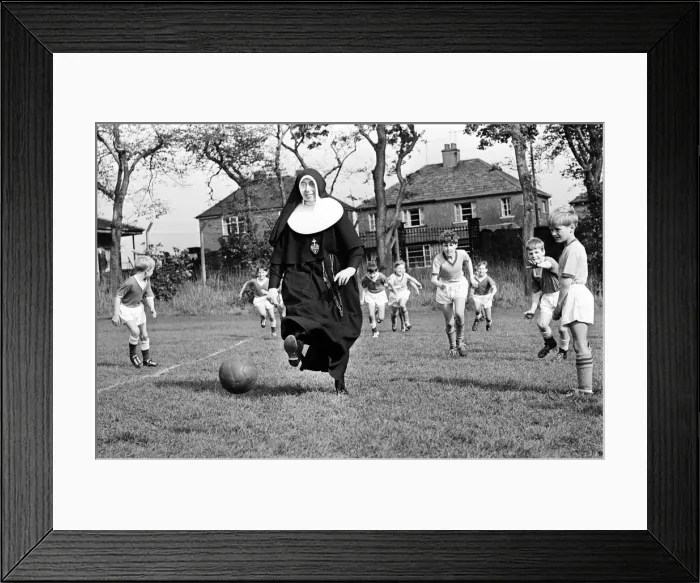 Framed Print : Sister Gabriel, chief coach, manager and trainer of the St Joseph