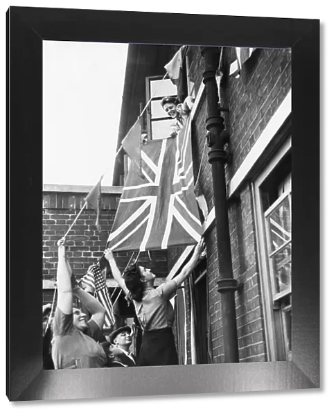 People seen here putting up bunting, Union Jacks and American flags in support of