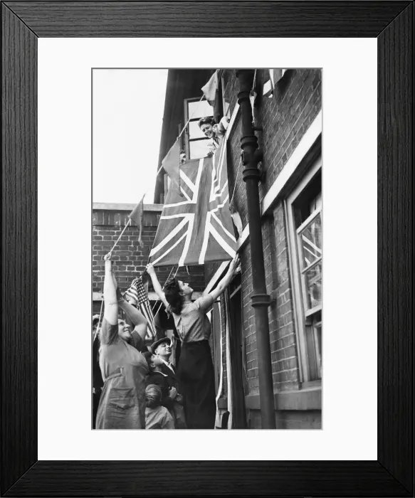 Framed Print : People seen here putting up bunting, Union Jacks and American flags in support of Framed Print : People seen here putting up bunting, Union Jacks and American flags in support of
