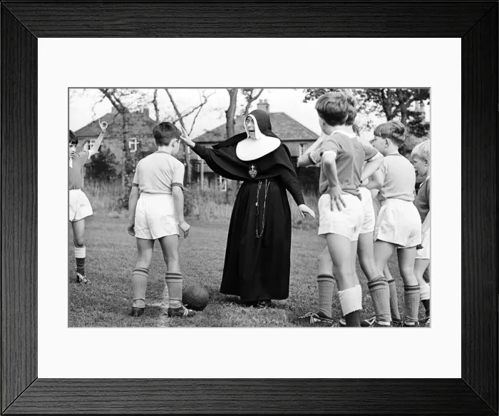 Framed Print : Sister Gabriel, chief coach, manager and trainer of the St Joseph