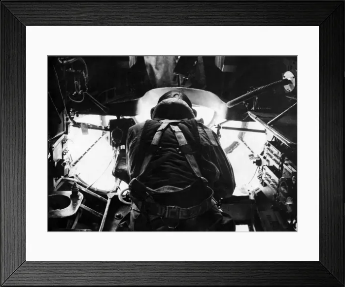 Framed Print : A bomb aimer in position in the nose of an RAF Stirling bomber during an assault Framed Print : A bomb aimer in position in the nose of an RAF Stirling bomber during an assault