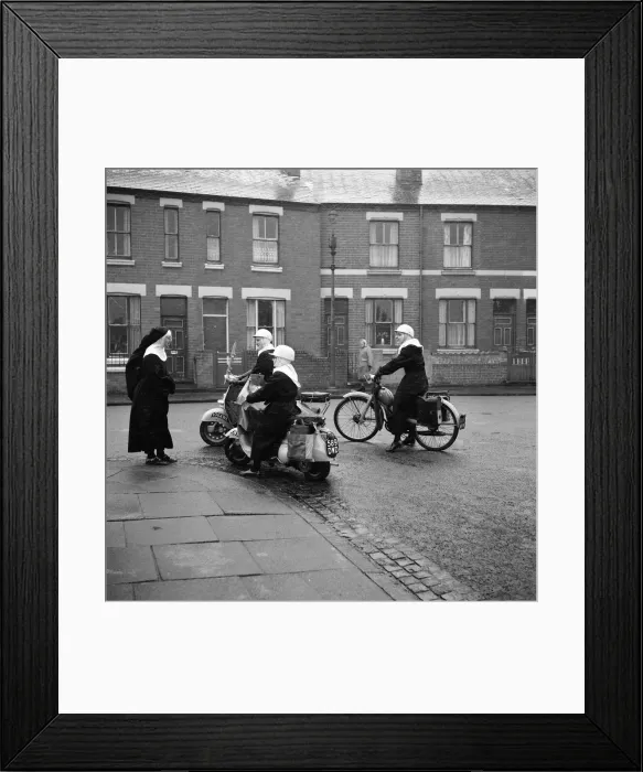 Framed Print : The Angels are three nuns who live in the toughest district of Foleshill