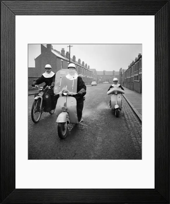 Framed Print : The Angels are three nuns who live in the toughest district of Foleshill