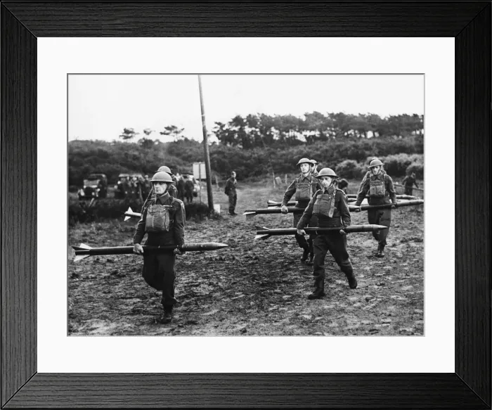 Framed Print : First pictures of the Home Guard A. A in action Carrying the rockets to the projectors Framed Print : First pictures of the Home Guard A. A in action Carrying the rockets to the projectors