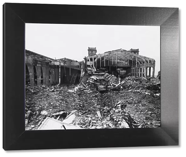 A view of the damaged docks in Cherbourg, where U.s Army engineers are rushing the job of