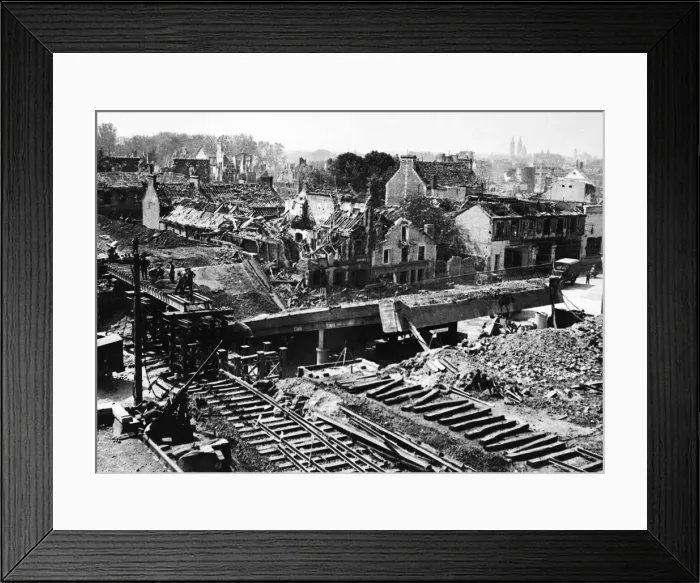 Framed Print : Bridge re-building in Caen. Picture showing, right, the railway bridge blown by Framed Print : Bridge re-building in Caen. Picture showing, right, the railway bridge blown by