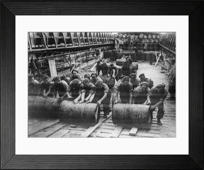 Framed Print : Men of RAF regiment arrive in Greece. Picture shows, unloading supplied of petrol from a Framed Print : Men of RAF regiment arrive in Greece. Picture shows, unloading supplied of petrol from a