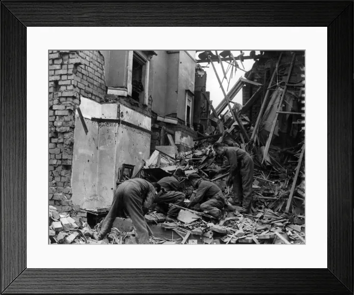 Framed Print : Salvaging amongst the wreckage of a dwelling which was damaged by Nazi raiders Framed Print : Salvaging amongst the wreckage of a dwelling which was damaged by Nazi raiders