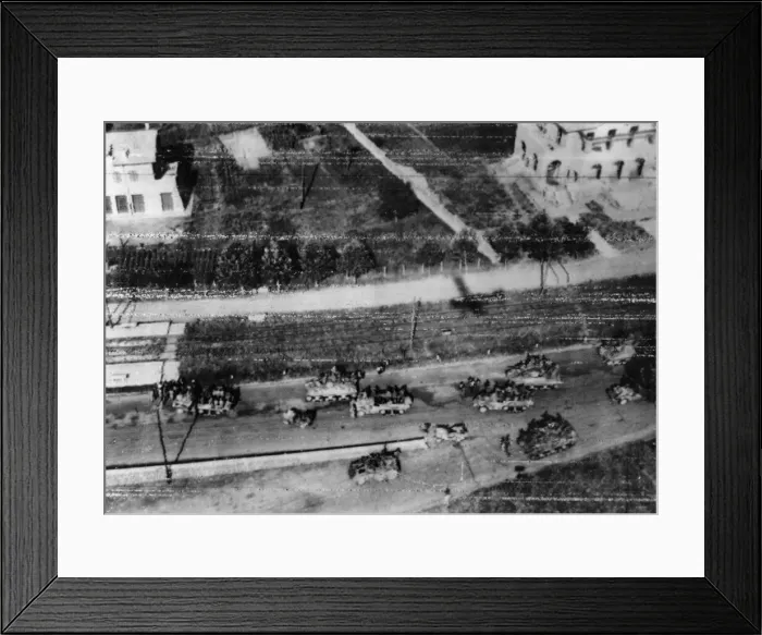 Framed Print : US military vehicles can be seen from this radioed aerial photo gathering in the southern Framed Print : US military vehicles can be seen from this radioed aerial photo gathering in the southern