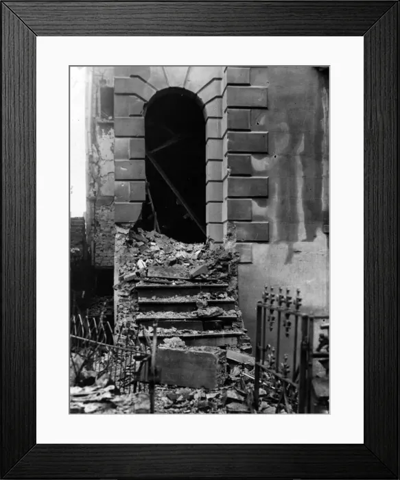 Framed Print : Corner of a house damaged by a bomb dropped in a South Wales town. Circa 1941 Framed Print : Corner of a house damaged by a bomb dropped in a South Wales town. Circa 1941