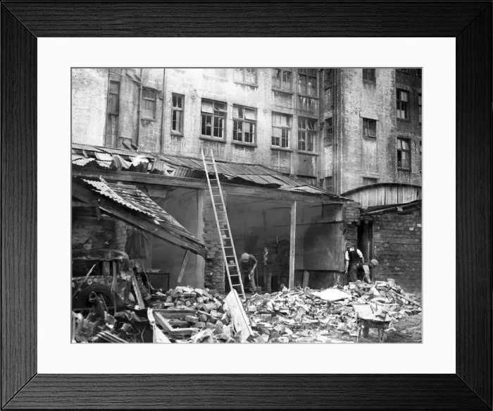 Framed Print : Bomb damage to back premises on the outskirts of a South Wales town