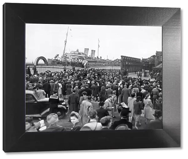 Repatriation at Liverpool Docks. The war is over and troops, ships