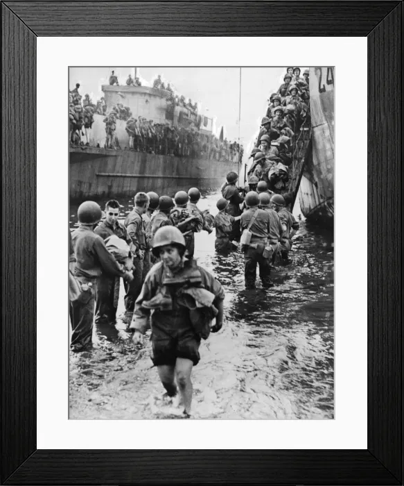 Framed Print : US Army nurse lands in Italy. Her overalls rolled above her knees Framed Print : US Army nurse lands in Italy. Her overalls rolled above her knees