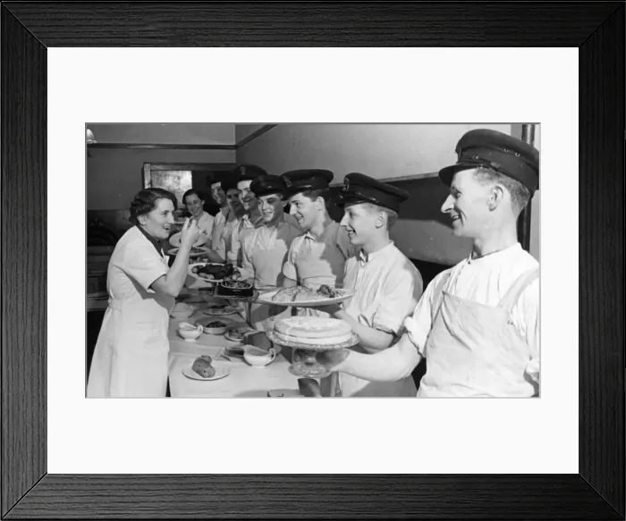 Framed Print : Women cookery experts teach men at a naval school. Naval ratings are taught by ex-school Framed Print : Women cookery experts teach men at a naval school. Naval ratings are taught by ex-school