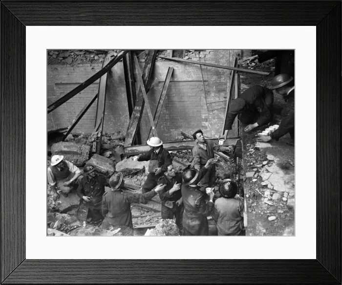 Framed Print : Men working in a building damaged by an Air Raid during the Blitz Framed Print : Men working in a building damaged by an Air Raid during the Blitz