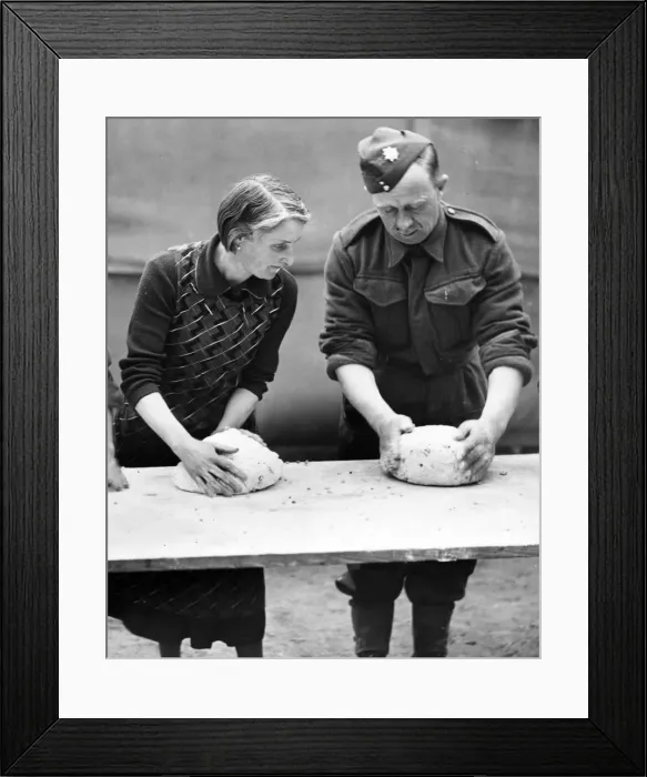 Framed Print : A French housewife lends a hand and gives hints on French cooking at the Army School of Framed Print : A French housewife lends a hand and gives hints on French cooking at the Army School of
