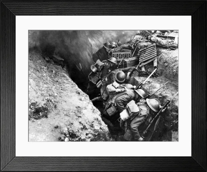 Framed Print : British troops cower as a shell bursts on the parapet of their trench