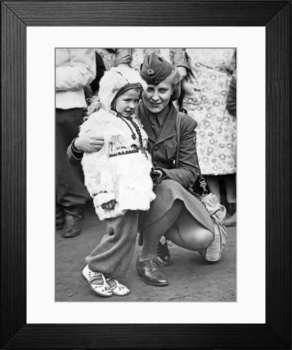 Framed Print : It is home away from home for the little girl in the reindeer coat