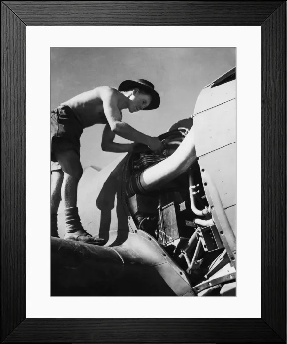 Framed Print : Leading aircraft man R. J. Fennell of Margate, Kent hard at work on the engine of an R. A Framed Print : Leading aircraft man R. J. Fennell of Margate, Kent hard at work on the engine of an R. A