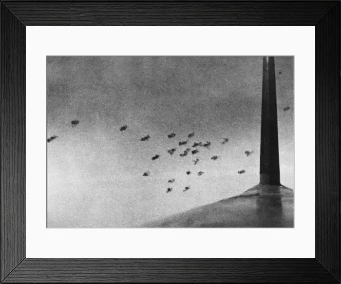 Framed Print : Anti-aircraft shells burst over Southern England trying to repel another air raid by Framed Print : Anti-aircraft shells burst over Southern England trying to repel another air raid by