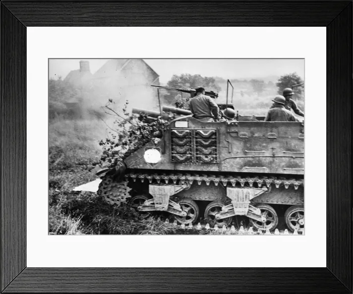 Framed Print : One of a column of camouflaged M7 tanks blasts away with another round at German Framed Print : One of a column of camouflaged M7 tanks blasts away with another round at German