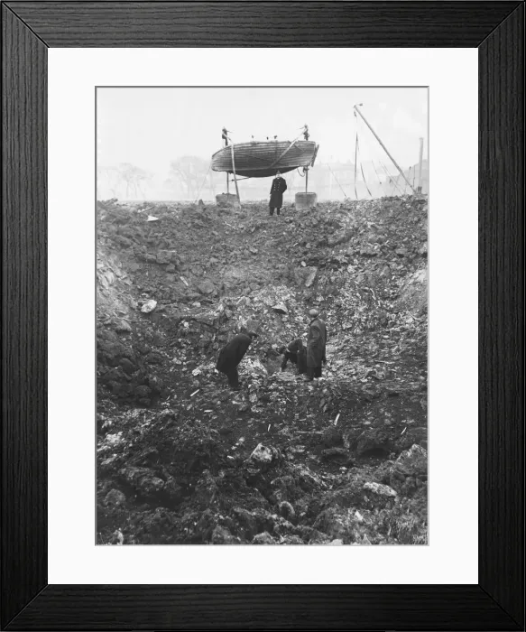 Framed Print : A crater made by a German bomb in an air raid on a school in Wallasey, Merseyside Framed Print : A crater made by a German bomb in an air raid on a school in Wallasey, Merseyside