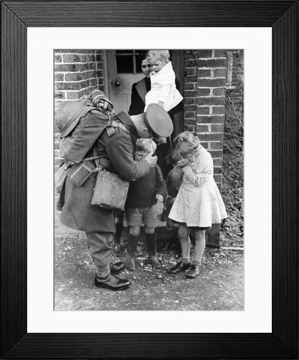 Framed Print : John Maynard, back from leave. Picture shows him re-united with children and a lady Framed Print : John Maynard, back from leave. Picture shows him re-united with children and a lady