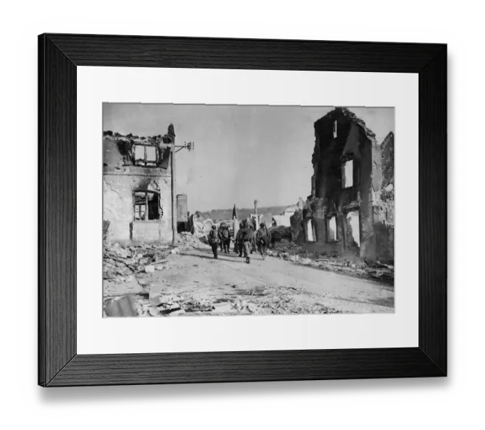 Framed Print : American infantrymen movie through a wrecked street in a shattered town advancing to Framed Print : American infantrymen movie through a wrecked street in a shattered town advancing to