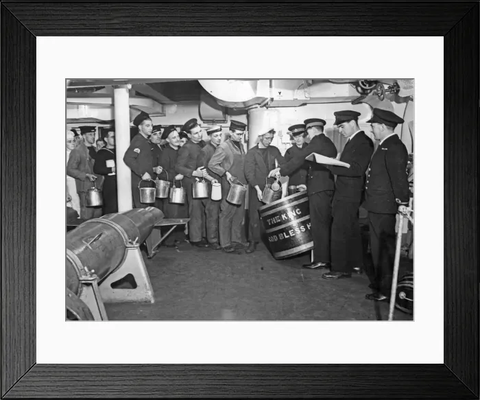 Framed Print : Below deck of HMS George V, a line of seamen queue to collect the daily rum ration for Framed Print : Below deck of HMS George V, a line of seamen queue to collect the daily rum ration for