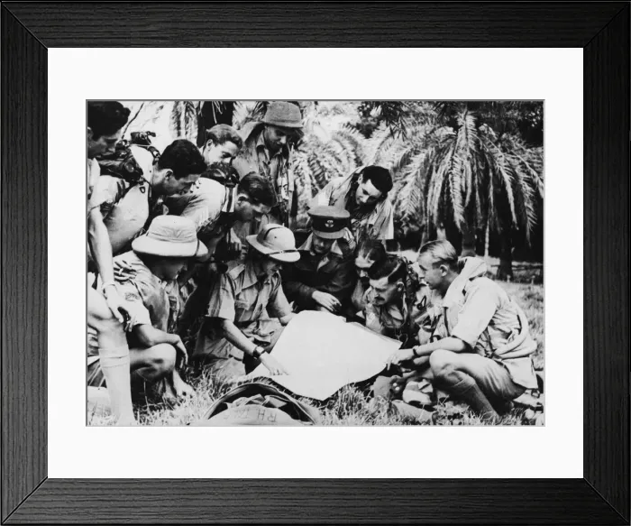 Framed Print : A Hudson crew operating over Burma. In a jungle clearing an RAF engineer briefs a Framed Print : A Hudson crew operating over Burma. In a jungle clearing an RAF engineer briefs a