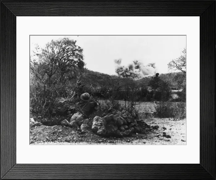 Framed Print : British troops take Mount Popa in Burma. A British soldier watching an air strike Framed Print : British troops take Mount Popa in Burma. A British soldier watching an air strike