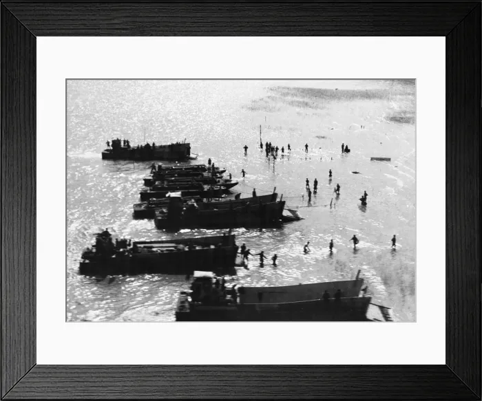 Framed Print : The landings at Akyab. Invasion barges with troops wading ashore to capture the Port