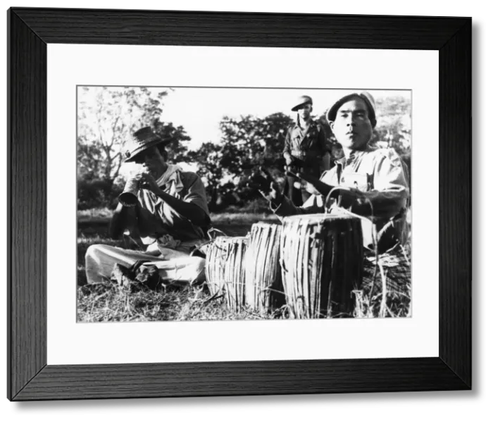 Framed Print : Behind the lines in Burma at Christmas 1944, British Troops attend a party at which Framed Print : Behind the lines in Burma at Christmas 1944, British Troops attend a party at which
