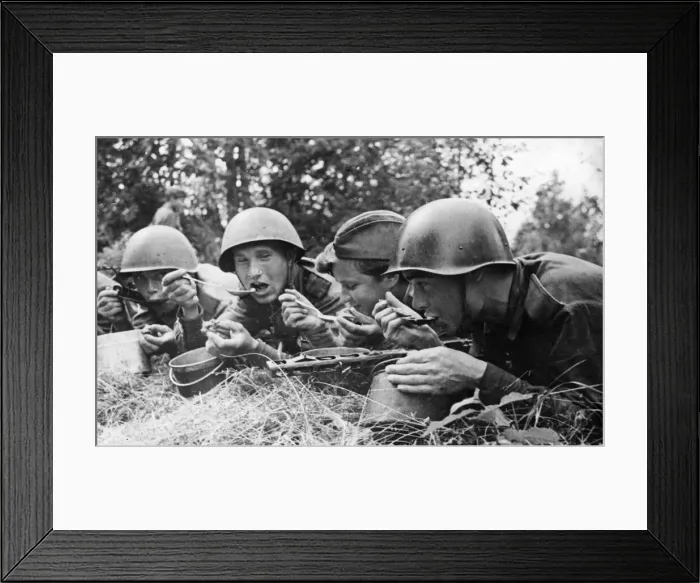 Framed Print : Victories make good appetites. Front line meal in USSR. Mealtime on the advancing Soviet