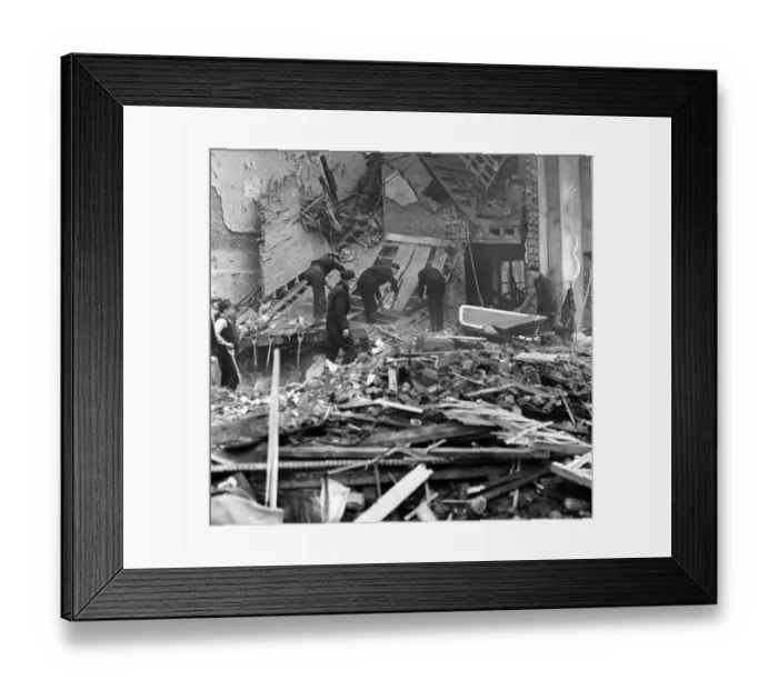 Framed Print : ARP workers searching the debris of one of the bombed houses in London for a victim Framed Print : ARP workers searching the debris of one of the bombed houses in London for a victim
