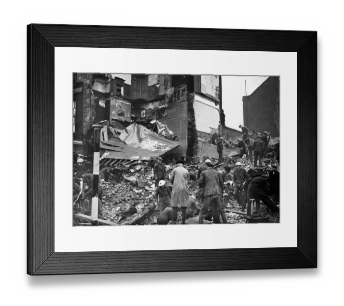 Framed Print : Rescue workers search debris at a bombed house in North West London. January 1941 Framed Print : Rescue workers search debris at a bombed house in North West London. January 1941