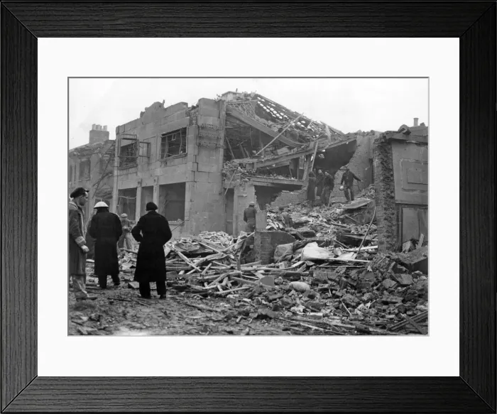 Framed Print : Bomb damage sustained by a big store in South East London. 18th January 1943 Framed Print : Bomb damage sustained by a big store in South East London. 18th January 1943