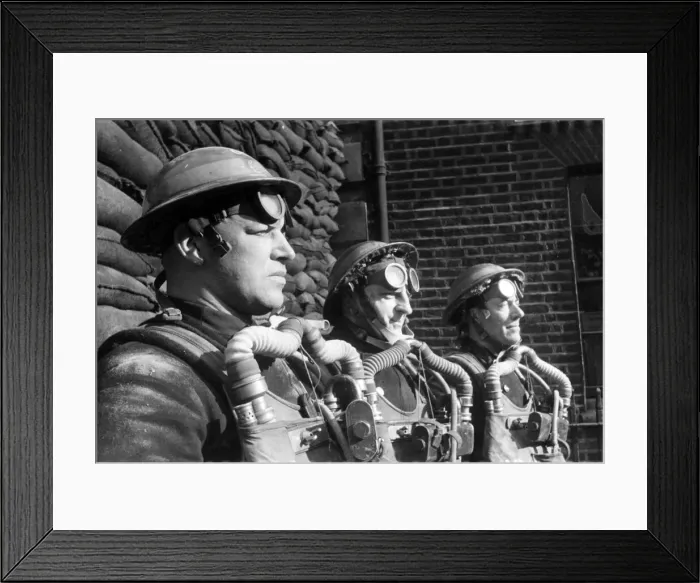 Framed Print : Firefighters wearing breathing apparatus during a training exercise. Circa 1940 Framed Print : Firefighters wearing breathing apparatus during a training exercise. Circa 1940