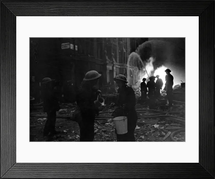 Framed Print : Scenes following a raid at Bolsover Street, London. Circa 1940 Framed Print : Scenes following a raid at Bolsover Street, London. Circa 1940