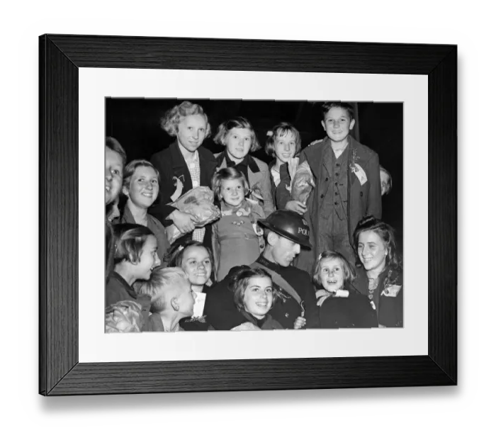 Framed Print : Evacuees arrive in back in London. It was good to to see a London bobby again Framed Print : Evacuees arrive in back in London. It was good to to see a London bobby again