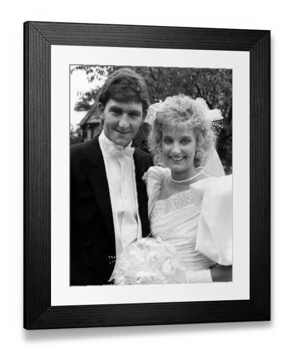 Framed Print : Manchester United footballer Norman Whiteside with his bride on their wedding day