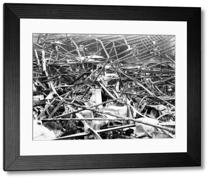 Framed Print : Wreckage following an air raid attack in South Wales. Circa 1941 Framed Print : Wreckage following an air raid attack in South Wales. Circa 1941