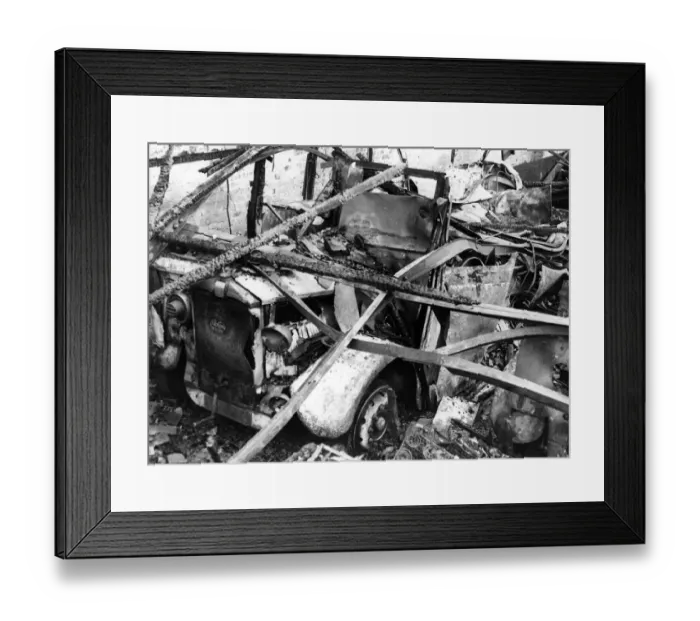 Framed Print : A damaged Albion motor car in South Wales following an attack by Nazi raiders. Circa 1941 Framed Print : A damaged Albion motor car in South Wales following an attack by Nazi raiders. Circa 1941