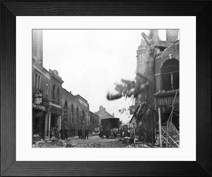 Framed Print : A building comes down after another German Air Raid during World War Two Framed Print : A building comes down after another German Air Raid during World War Two