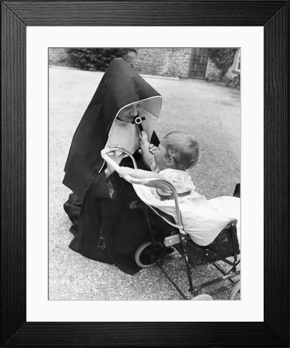 Framed Print : Master Geoffrey Appleby with one of the sisters in the home for Blitzed babies Framed Print : Master Geoffrey Appleby with one of the sisters in the home for Blitzed babies